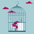 The businessman was trapped in a bird cage. Royalty Free Stock Photo